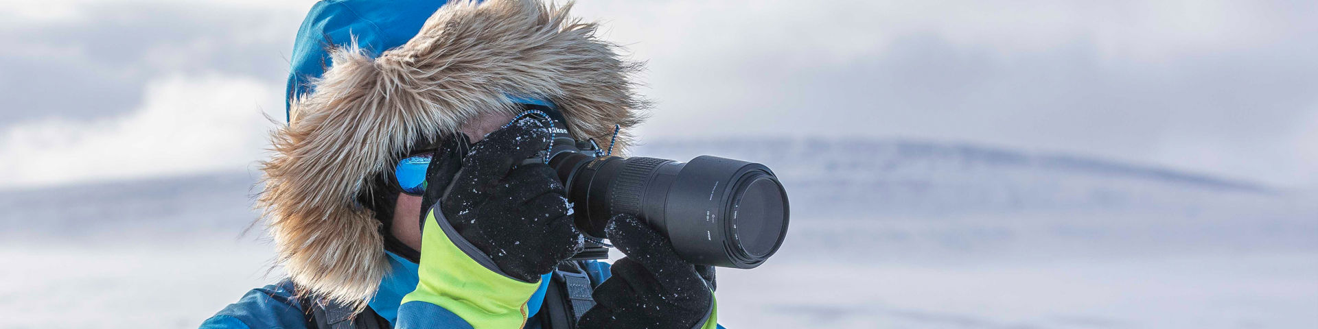 Valokuvaaja talvella, kuva: Merja Paakkanen